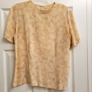 Casual Corner size 4 100% silk pale yellows short sleeve blouse.